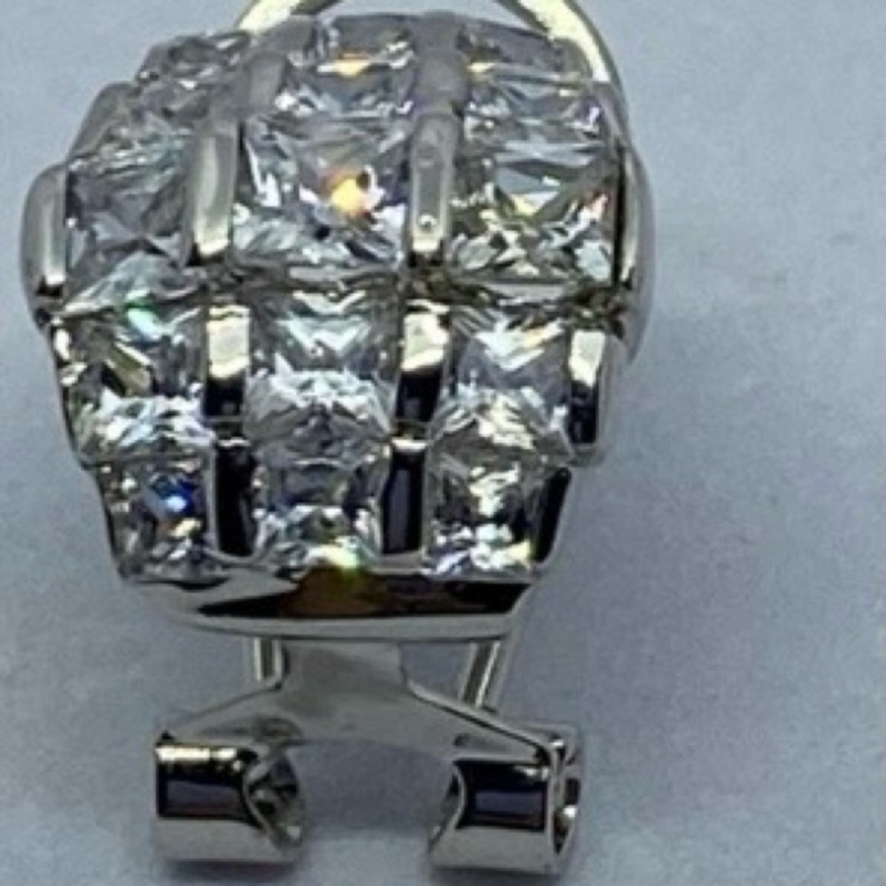 Silver tone CZ pierced earrings.
